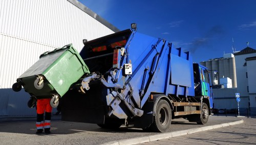 Van and crew outside a Wanstead terrace, ready to clear waste